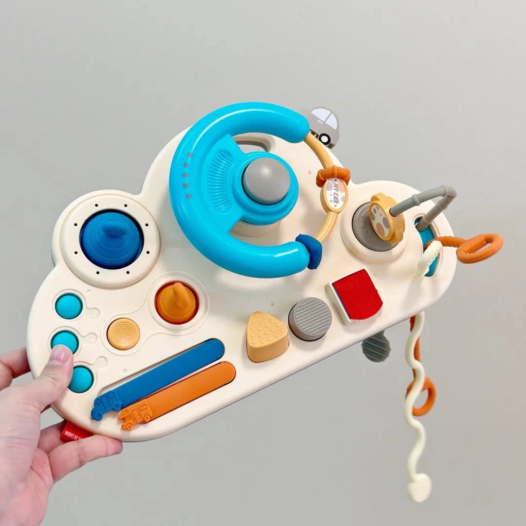 Busy Board avec volant Le coffre à jouets