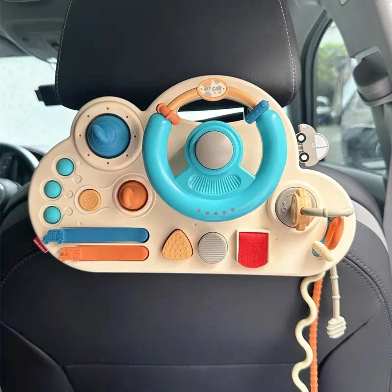 Busy Board avec volant Le coffre à jouets