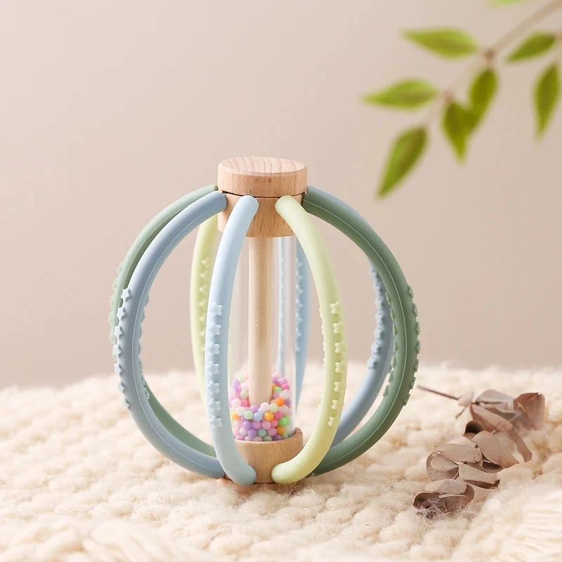Hochet Sensoriel en Bois pour Bébé, Tambour de Pluie en Silicone, Soins Dentaires pour Nouveau-Né, Gomme Anti-manger, Main Molaire, Bâton Cadeau Le coffre à jouets